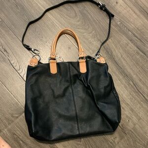 Black leather purse with tan trim